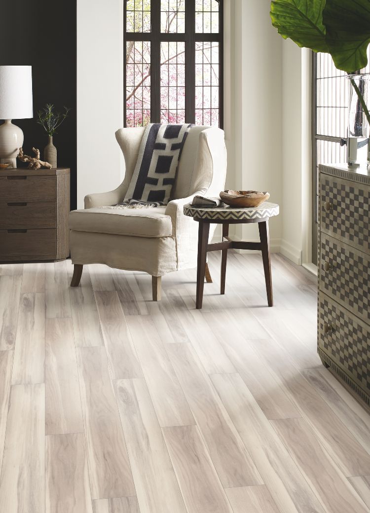 luxury vinyl flooring in a Hammonton, NJ, living room with insurance restoration services from Mazza's Flooring America