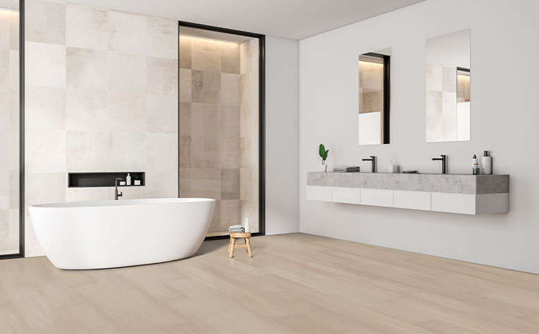 luxury vinyl tile flooring in bathroom with blue accent wall