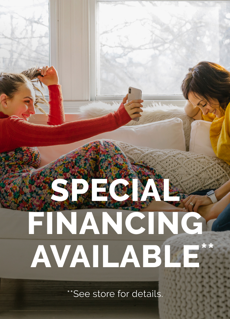 Special Financing Available, two girls sitting on sofa.