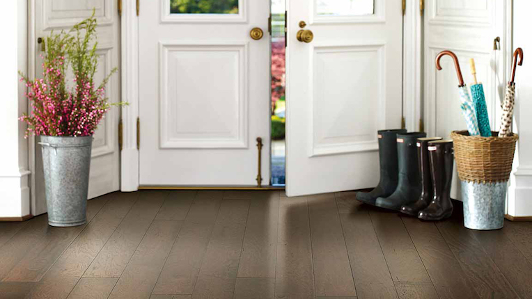 waterproof luxury vinyl plank flooring in a timeless entryway